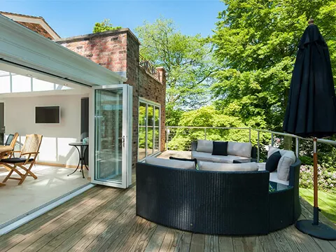 Bi-folding doors connecting the outdoors